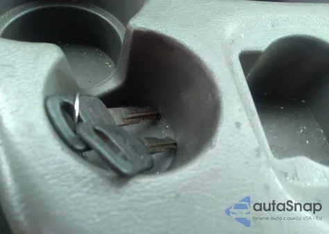 1999 Ford E-150 из США, поврежденный, VIN 1FTRE1424XHC34986